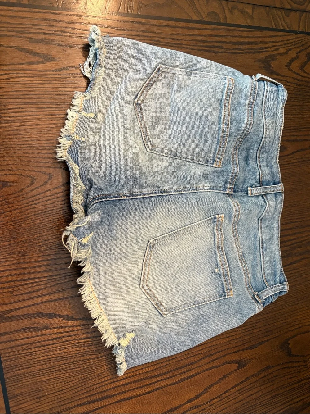 High-Rise Frayed Light Wash Denim Shorts